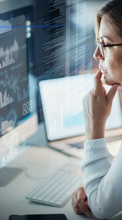 Data expert working at computer